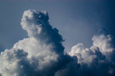 big cloud before storm light and dark sky stock