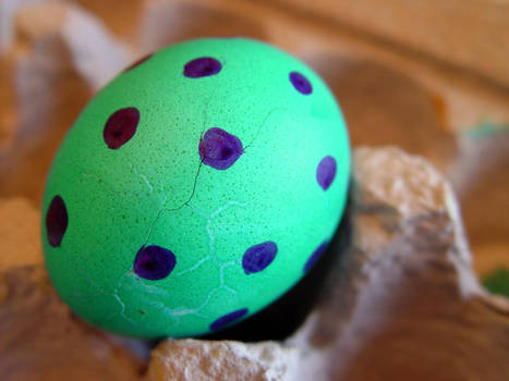 Purple spotted green egg