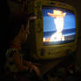 Woody watching Toy Story 2