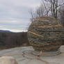 land art sphere integrated with patio and wall