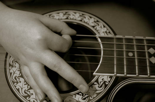 little hands playing guitar