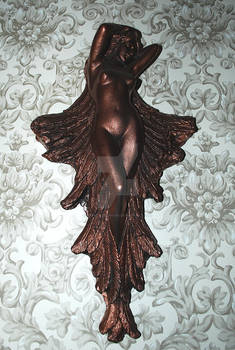 Winged Lady In Bronze plaster