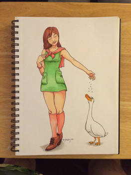 Girl feeding duck