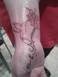 humming bird and flower tattoo
