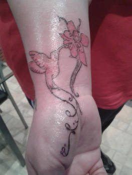 humming bird and flower tattoo