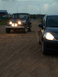 Jeep Wrangler and Nissan Tiida