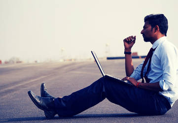 Man with Laptop, thinking