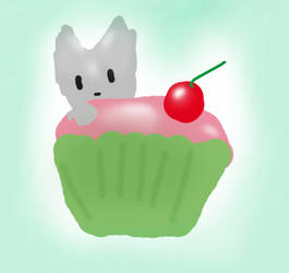 a kitty in a cupcake