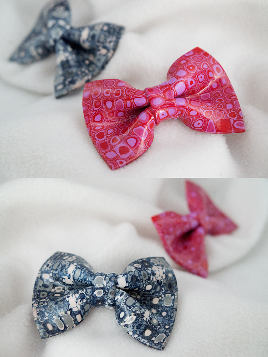 Bow-tie broochs