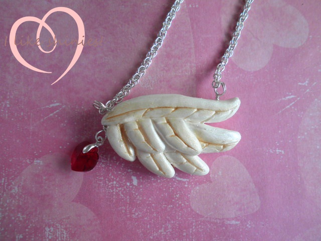 Lovers plume Valentines necklace by ilikeshiniesfakery