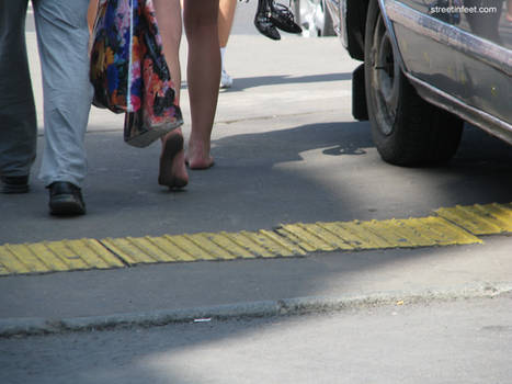 Barefoot girl walking barefoot in public