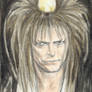 Goblin King with a chick on his head