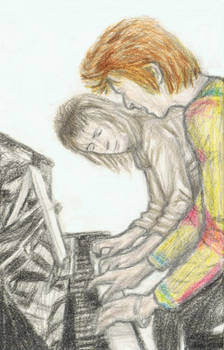 David Bowie playing piano with Mick Ronson