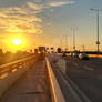 Sunset on a highway bridge