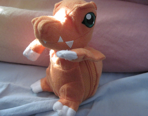 Another Agumon plushie.