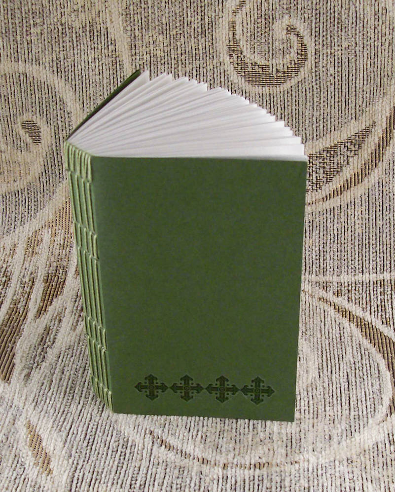 green stitches unlined journal by yatsu