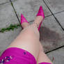 Crossed Legged in Pink Pumps