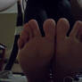 The soles of my bare feet
