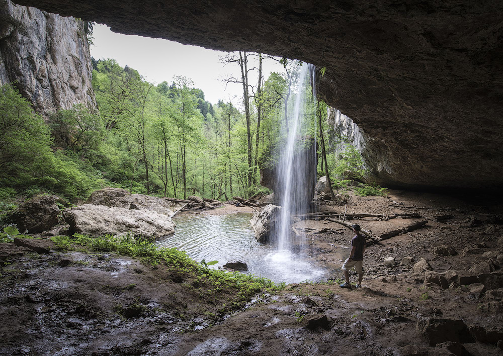 Next to the waterfall