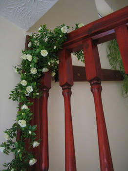 Red staircase with flowers