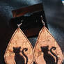 Kitty earrings on cork