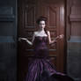 Beautiful woman in violet dress