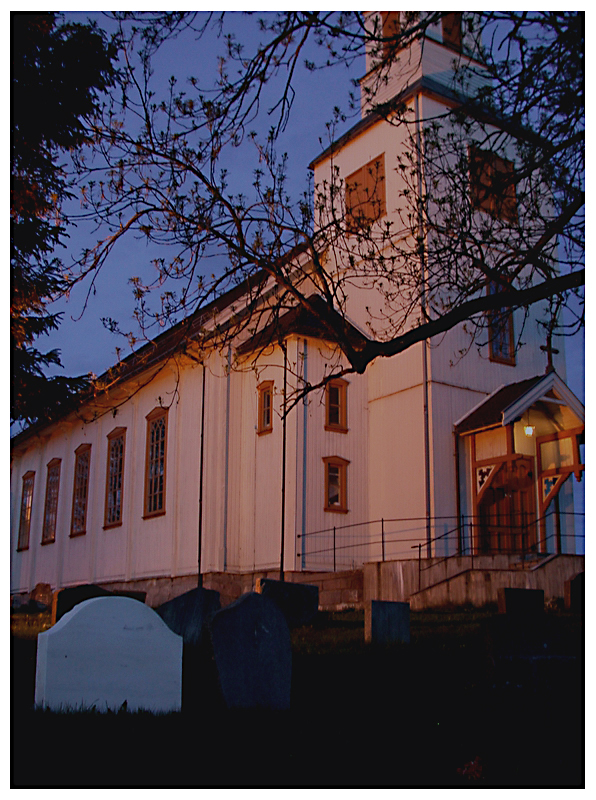 Wooden church at night