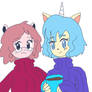 Peach and Amiko in cozy sweaters