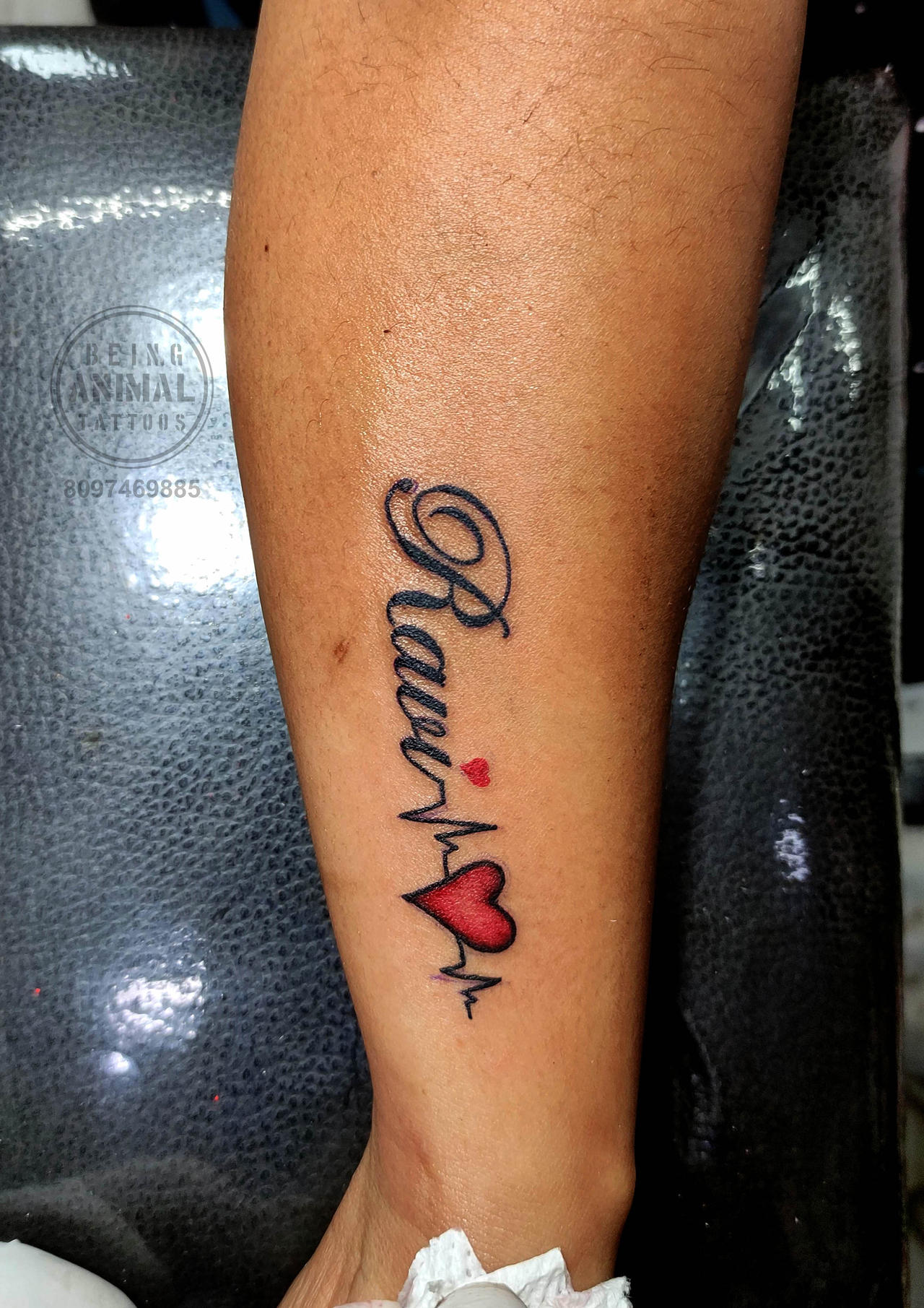 Heartbeat with Name: A Bold Tattoo Choice