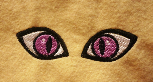 Test - Embroidered slit eyes