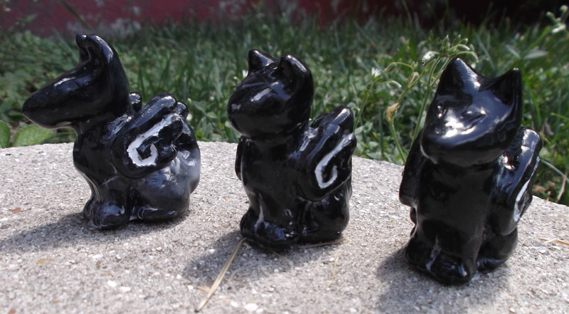 Black plastic sculptures