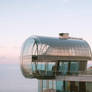 A Small Wonderful Glass House On The Edge Of A Cli
