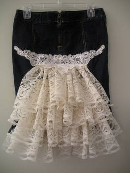 Denim skirt with lace bustle