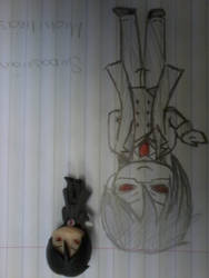 sebastian figurine and the drawing i did of it