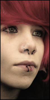 Piercings:4