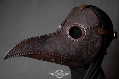 Brown plague doctor mask with engraving