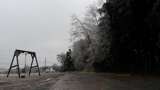 Driveway with a swing set(of some sort?)