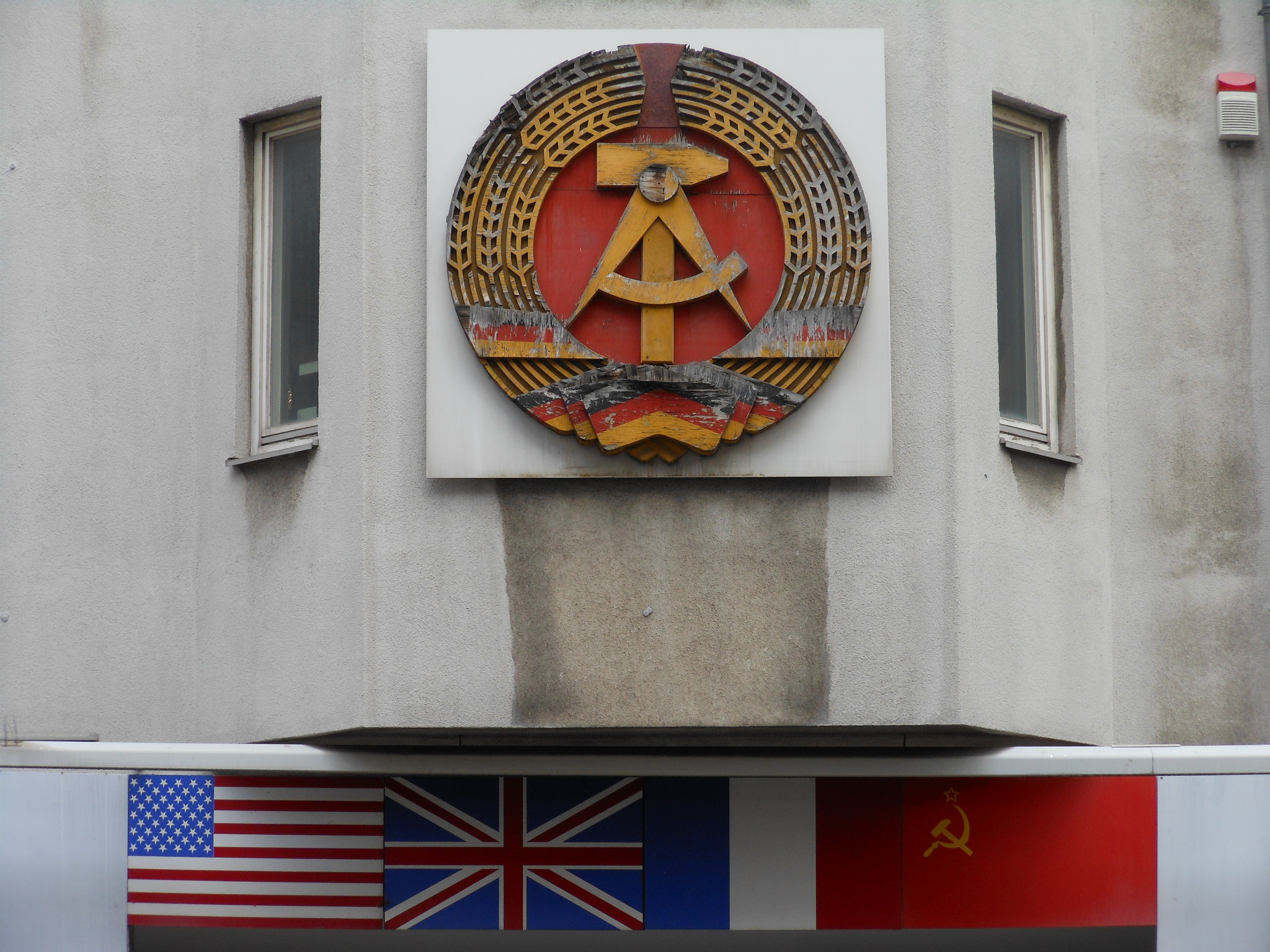 East Germany emblem and sector flags