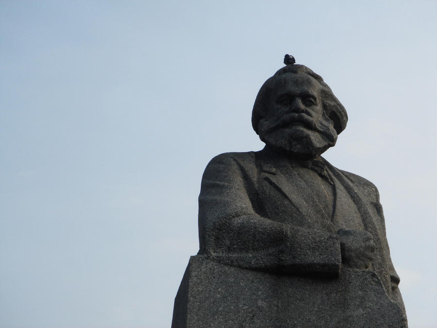 Marx with a pigeon on his head