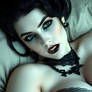 Seductive gothic woman resting 5376x3072. hksye