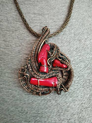 Fire flames. Red coral pendant. Wire wrapping