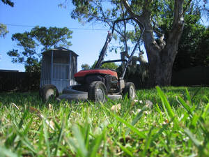 Mower in the Grass