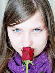 A girl with red rose