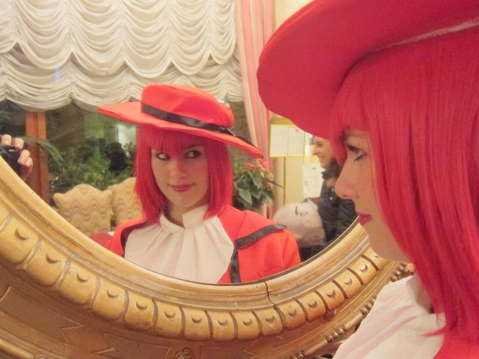 Madame Red in the mirror