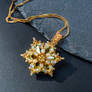 Golden snowflake pendant