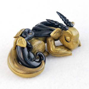 Sleeping Gold and Black Mother and Baby Dragons