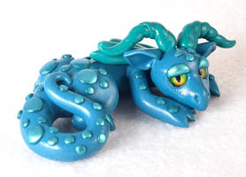 Sleepy Teal Dragon Figurine