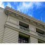 white building vs blue sky