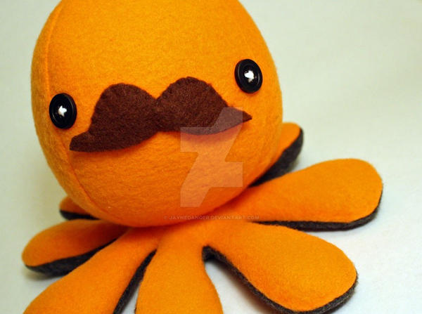 Orange mustache octoplushie