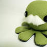 Another green mustache plushie